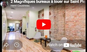 Bureau style loft à louer dans le Vieux‑Montréal avec murs de briques, pierres et lumière naturelle